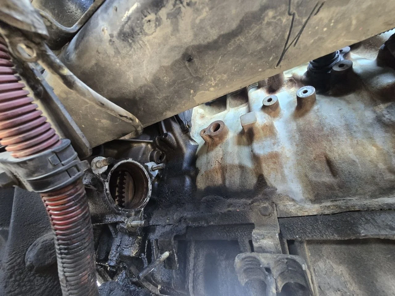 Final under-truck inspection after starter replacement