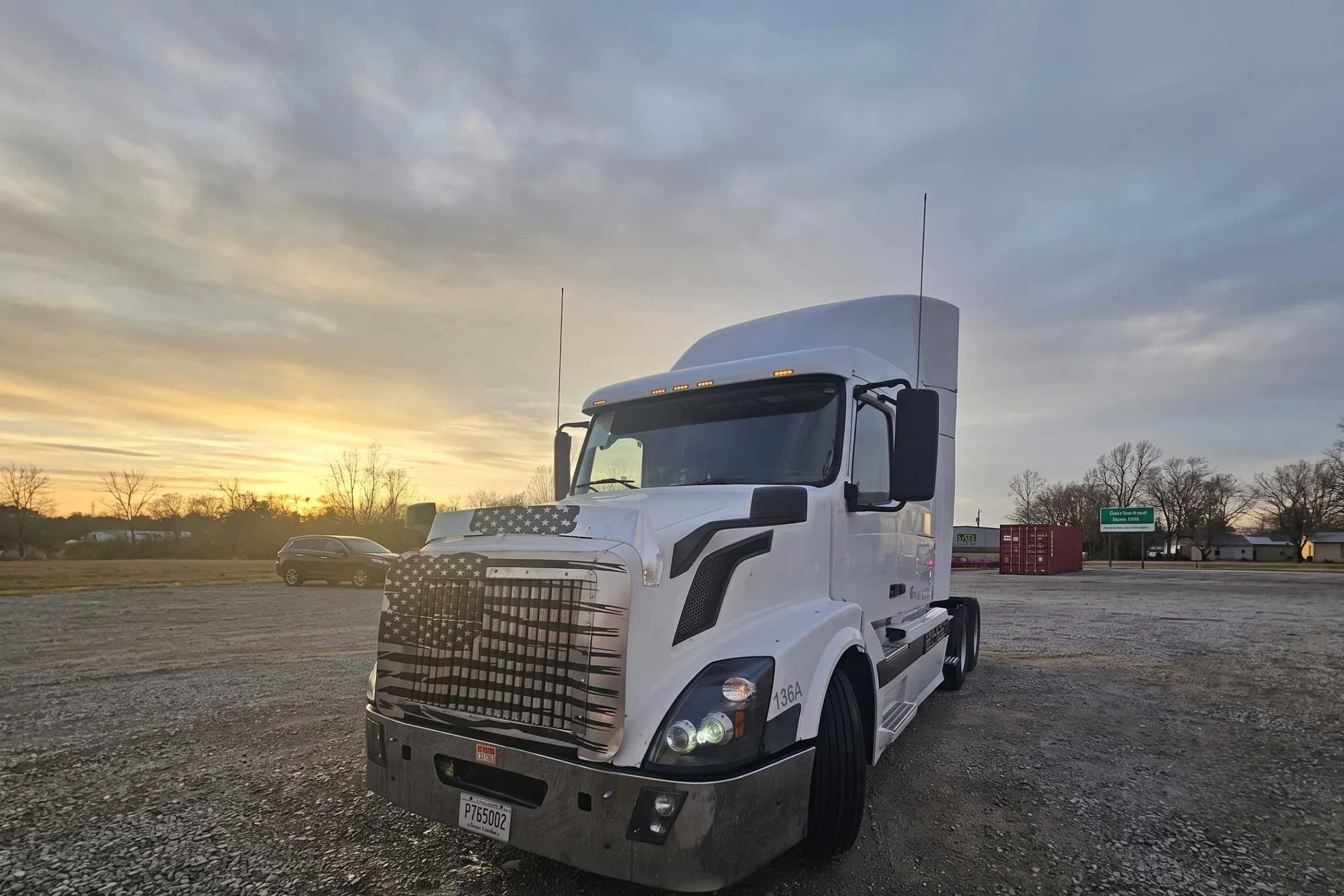 A&A Heavy Duty Repair & Towing rental truck parked at sunset